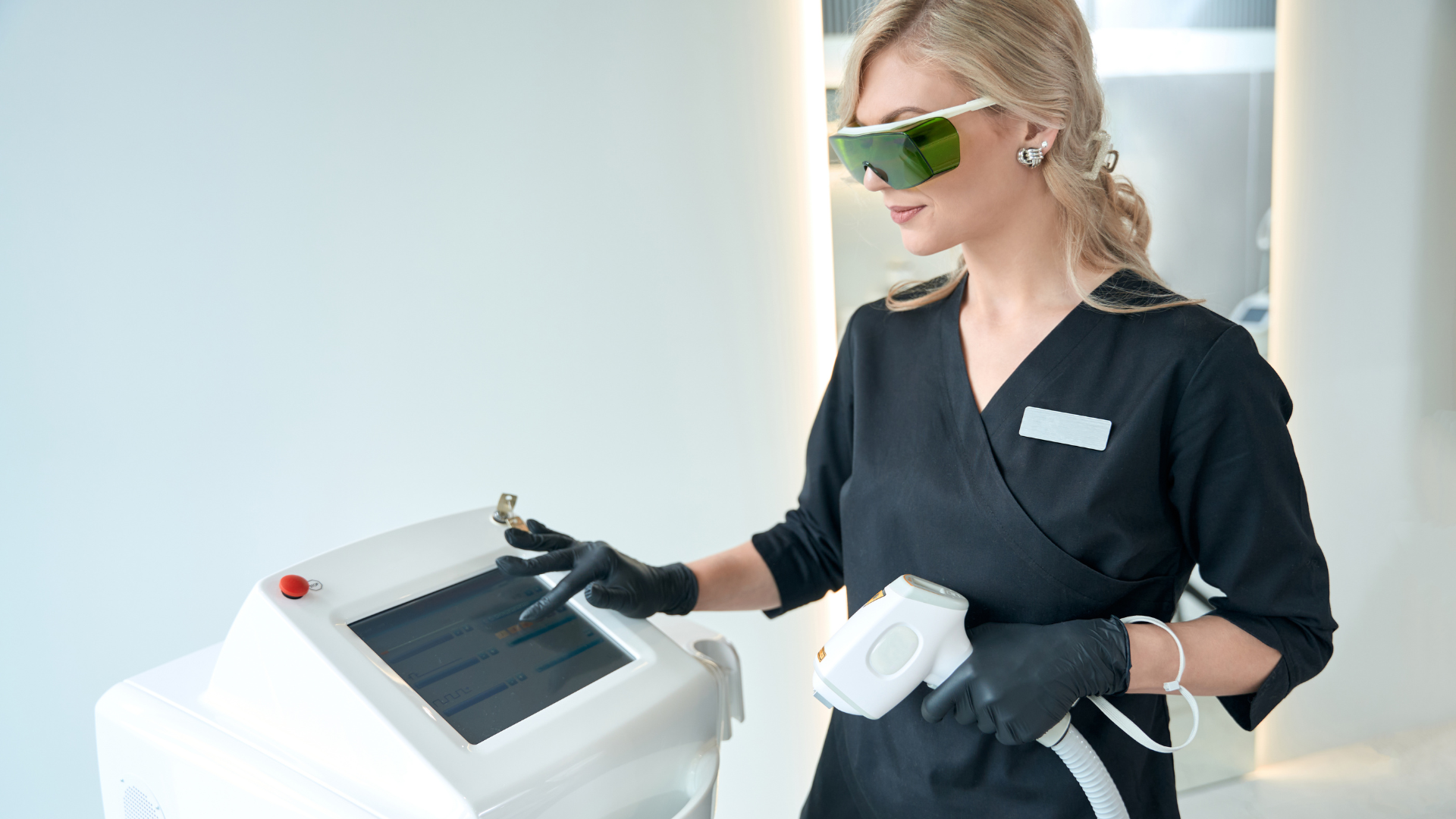 Woman with a computer documenting in-office treatments for anti-aging and skin rejuvenation