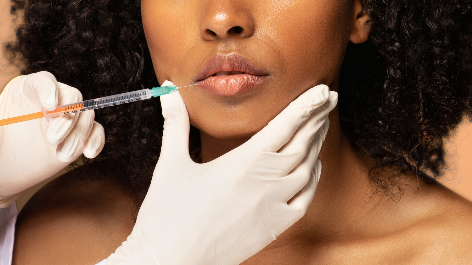 Woman getting a lip and mouth treatment for natural results