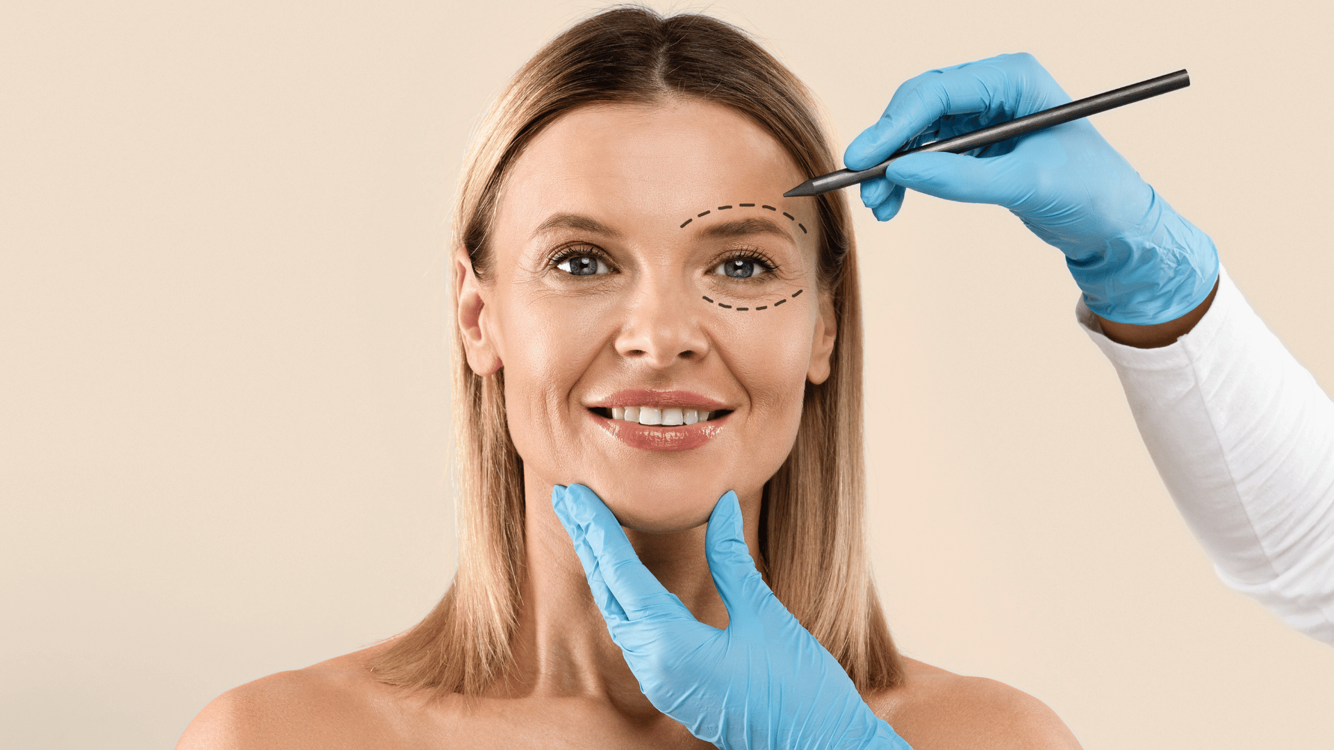 woman in her 40s getting marked up by a doctor for eye rejuvenation surgical or non-surgical treatment