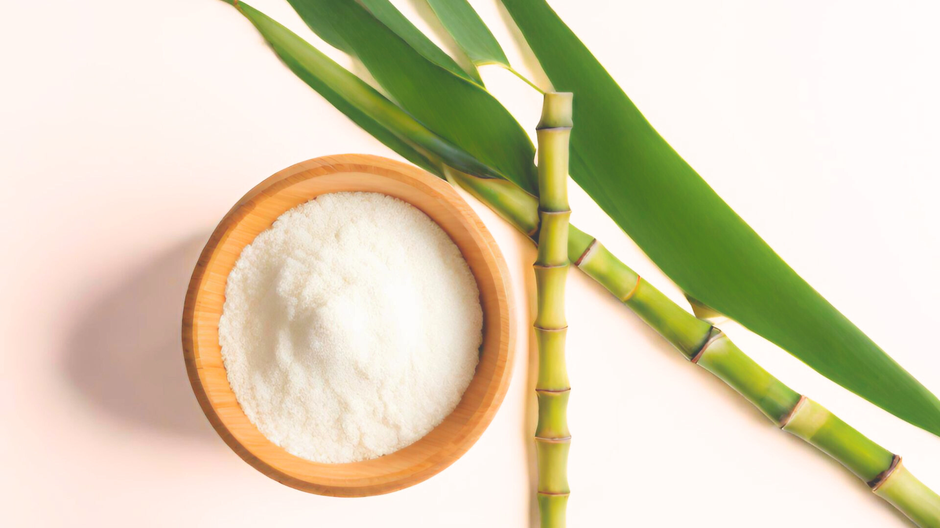 bamboo powder next to bamboo stems