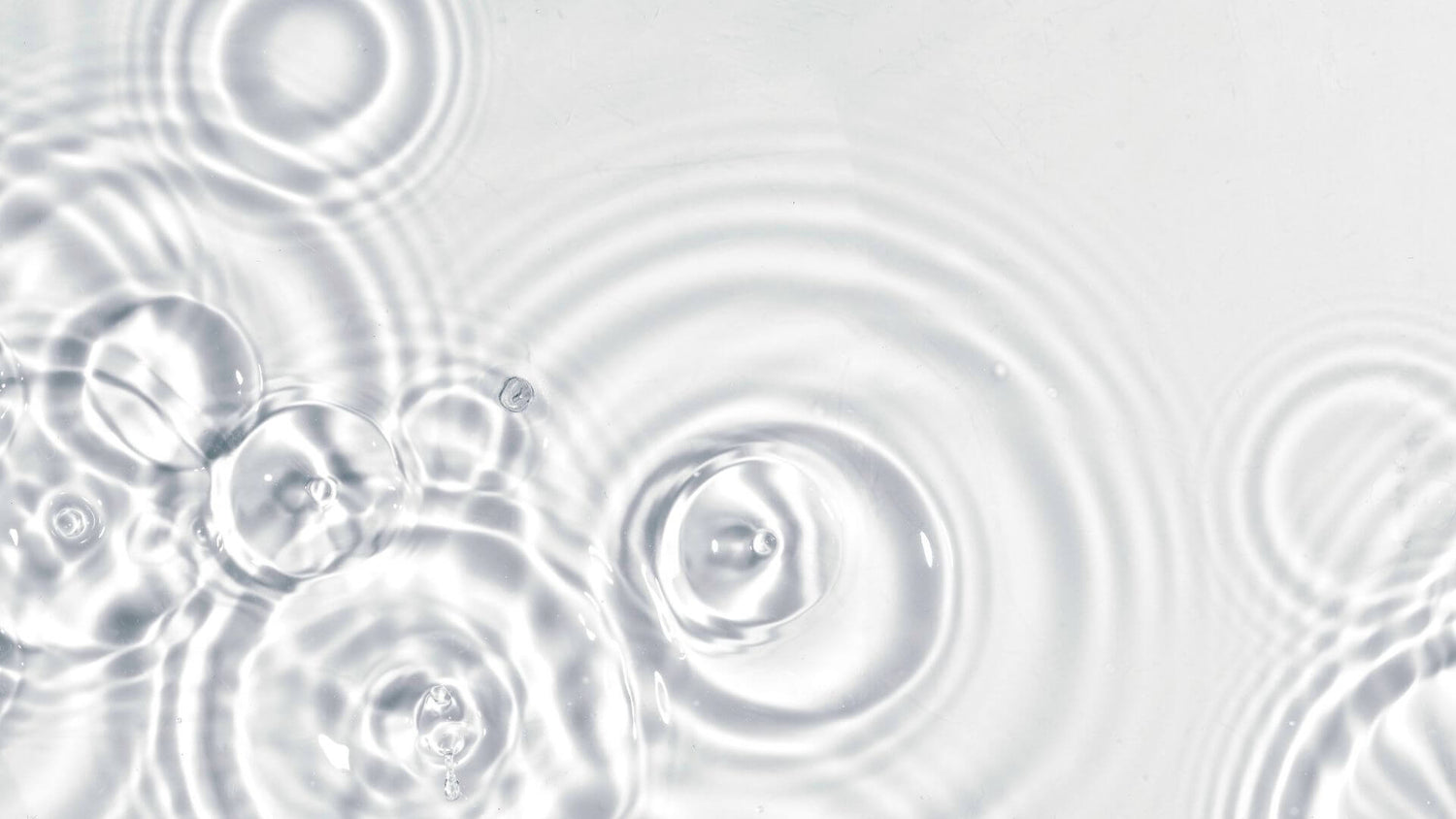 Ripples on a white background in a skincare product for skin hydration and elasticity.