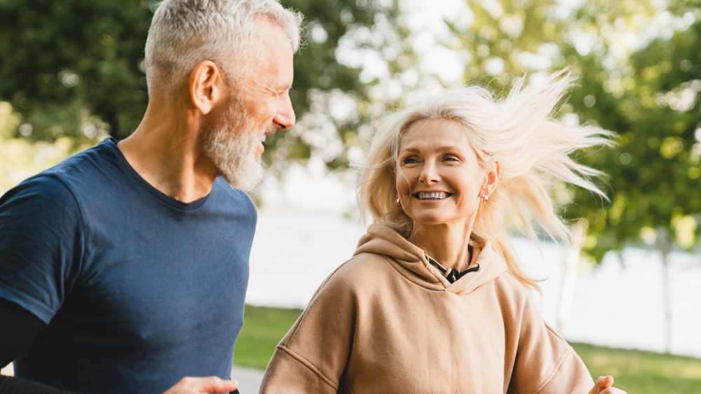 Man and woman running, a healthy habit for healthier skin