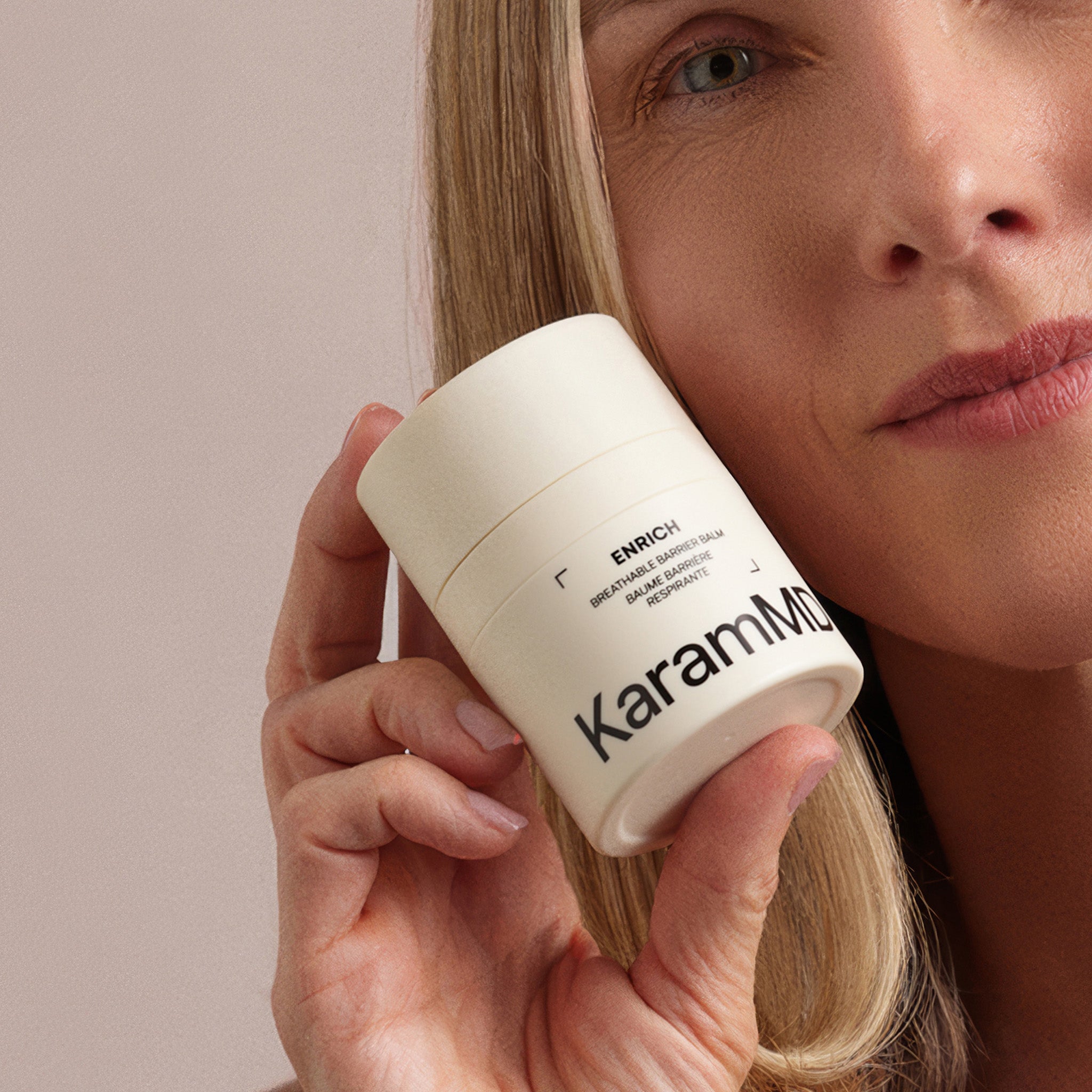 Side view of Enrich Breathable Barrier Balm container displaying product size and label for barrier protection.